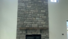 Stone fireplace completed