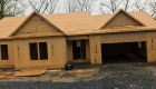 Roof trusses set & roof plywood installed