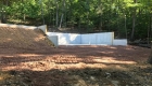 Concrete slabs poured & rough grading complete